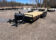 2026 Quality Steel & Aluminum 8320TILTEH14K Hydraulic Tilt Equipment Hauler on a gravel lot, showcasing its advanced tilting mechanism and robust construction.