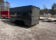 Sleek Discovery 7x16 Rover ET Enclosed Trailer with Blackout Package, showcased in an outdoor setting.