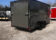 Sleek Discovery 7x16 Rover ET Enclosed Trailer with Blackout Package, showcased in an outdoor setting.