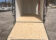Sleek Discovery 7x16 Rover ET Enclosed Trailer with Blackout Package, showcased in an outdoor setting.