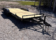 2025 BNM 7x18 Car/Toy Hauler with rear beavertail, pullout ramps, and black wheels