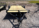 2025 BNM 7x18 Car/Toy Hauler with rear beavertail, pullout ramps, and black wheels