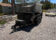 2025 BNM 6x10 Heavy Duty Dump Trailer with dual axles, tarp hood, and LED lighting