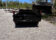 2025 BNM 6x10 Heavy Duty Dump Trailer with dual axles, tarp hood, and LED lighting