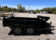 2025 BNM 6x10 Heavy Duty Dump Trailer with dual axles, tarp hood, and LED lighting