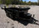 2025 BNM 6x10 Heavy Duty Dump Trailer with dual axles, tarp hood, and LED lighting