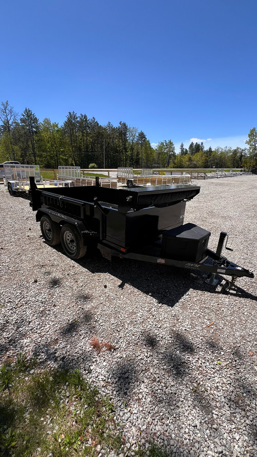 2025 BNM 6x10 Heavy Duty Dump Trailer with dual axles, tarp hood, and LED lighting