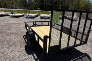 0459_2025 BNM 6x10 Heavy Duty Low Side Utility Trailer – Compact Utility 2025 BNM 6x10 Heavy Duty Low Side Utility Trailer with fold-in gate and spring axle
