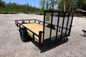 2025 BNM 6x12 Heavy Duty Low Side Utility Trailer in black with fold-in gate