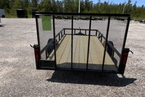 2025 BNM 6x12 Heavy Duty Low Side Utility Trailer in black with fold-in gate