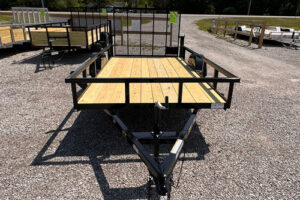 2025 BNM 6x12 Heavy Duty Low Side Utility Trailer in black with fold-in gate