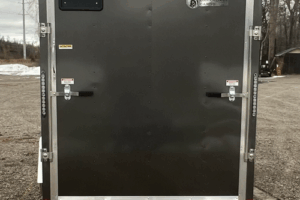2026 Darkhorse 6x12 wedge enclosed trailer with charcoal exterior and ramp door